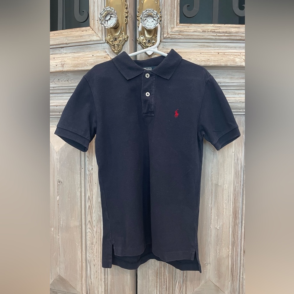 Polo by Ralph Lauren 
Boys size 7
Navy with red horse
Great Condition